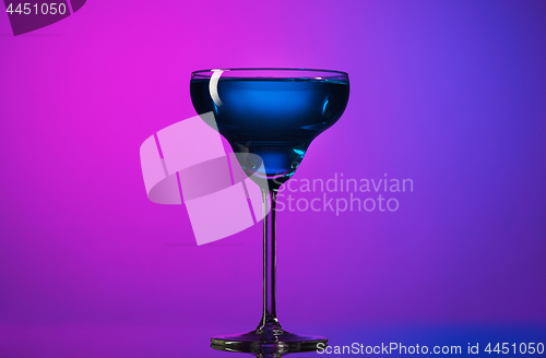 Image of The wine glasses standing on the table at studio