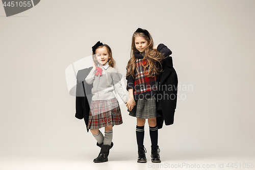 Image of The fashion portrait of young beautiful teen girls at studio