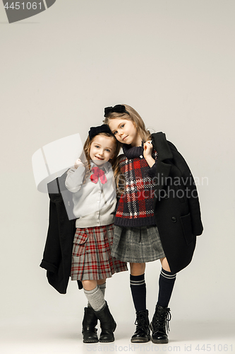 Image of The fashion portrait of young beautiful teen girls at studio