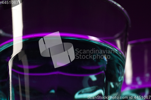 Image of Two wine glasses standing on the table at studio