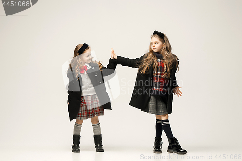 Image of The fashion portrait of young beautiful teen girls at studio