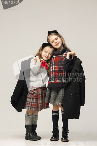 Image of The fashion portrait of young beautiful teen girls at studio