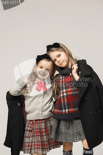 Image of The fashion portrait of young beautiful teen girls at studio