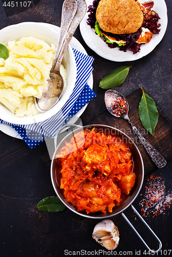 Image of fried cabbage and mashed potato