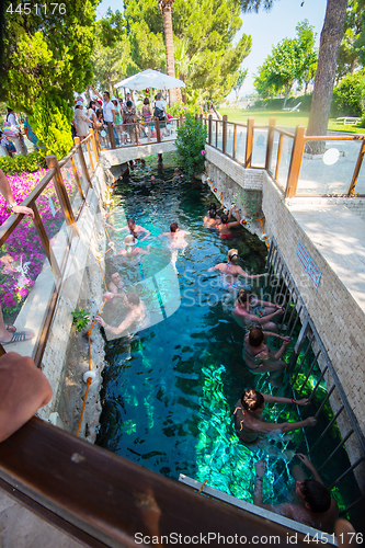 Image of Tourists swim in antique Cleopatra pool