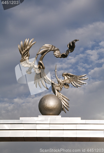 Image of TASHKENT, UZBEKISTAN - MAY 10, 2014: Statue of the storks over the globe