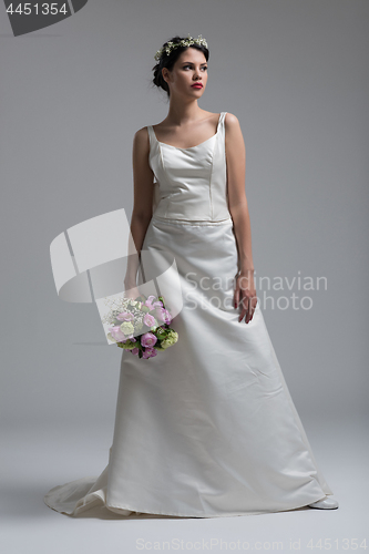 Image of bride with a bouquet  isolated on white background