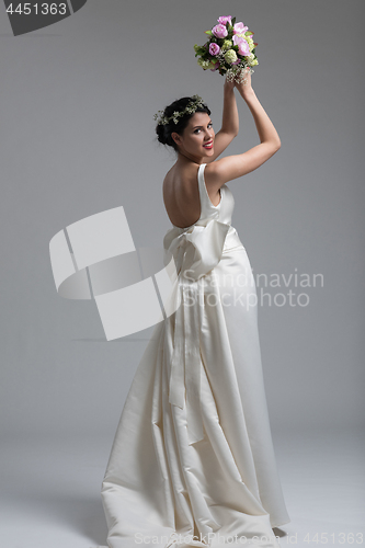 Image of bride with a bouquet  isolated on white background