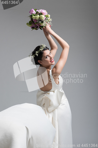 Image of bride with a bouquet  isolated on white background