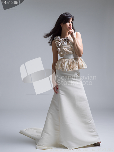 Image of Portrait of beautiful young women in wedding dress