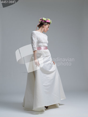 Image of Portrait of beautiful young women in wedding dress