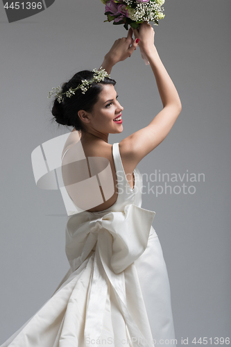 Image of bride with a bouquet  isolated on white background