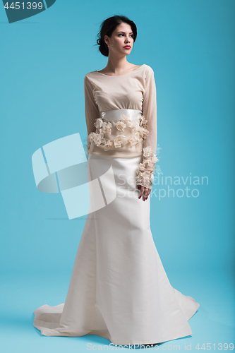 Image of beautiful young women in wedding dress