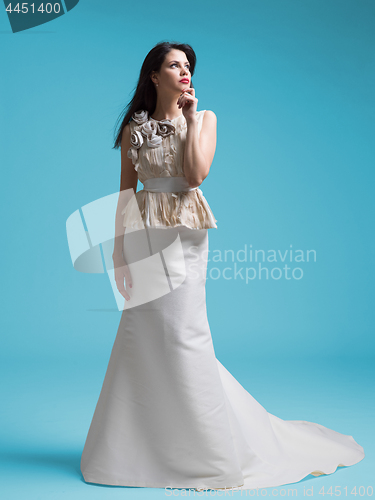 Image of beautiful young women in wedding dress