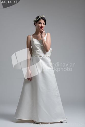 Image of Portrait of beautiful young women in wedding dress