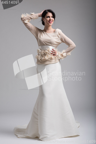 Image of Portrait of beautiful young women in wedding dress
