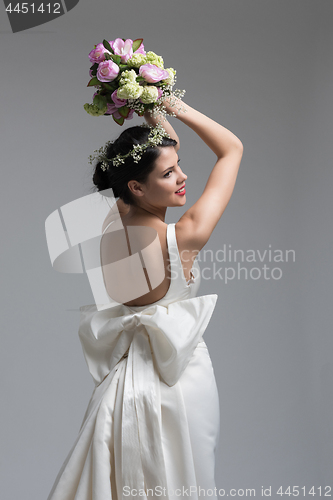 Image of bride with a bouquet  isolated on white background