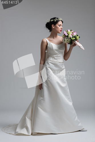 Image of bride with a bouquet  isolated on white background