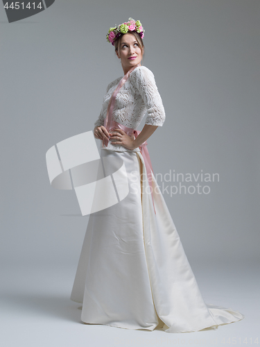 Image of Portrait of beautiful young women in wedding dress