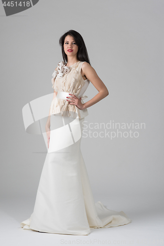 Image of Portrait of beautiful young women in wedding dress