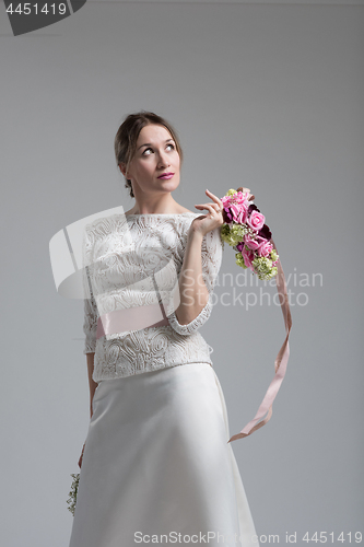 Image of bride with a bouquet  isolated on white background