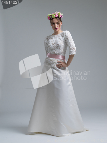 Image of Portrait of beautiful young women in wedding dress