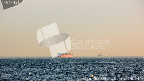Image of Large cargo container ship passing through Bosphorus, Istanbul, Turkey.