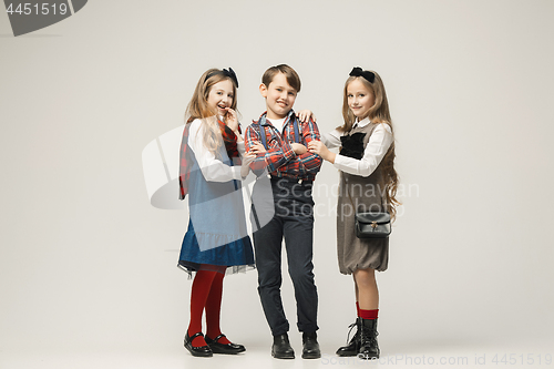 Image of Cute stylish children on white studio background