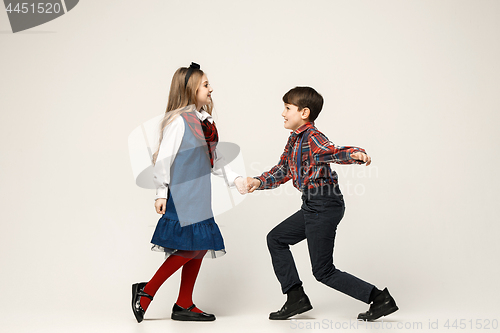 Image of Cute stylish children on white studio background