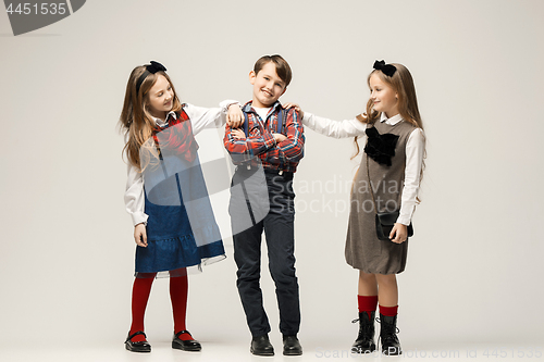 Image of Cute stylish children on white studio background