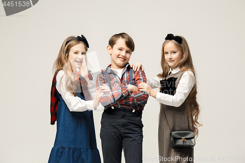 Image of Cute stylish children on white studio background