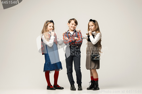 Image of Cute stylish children on white studio background