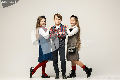 Image of Cute stylish children on white studio background