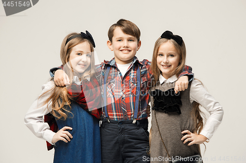 Image of Cute stylish children on white studio background