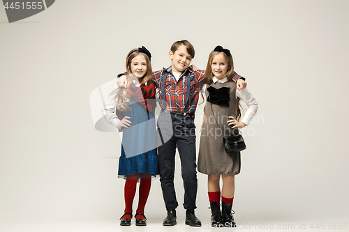 Image of Cute stylish children on white studio background