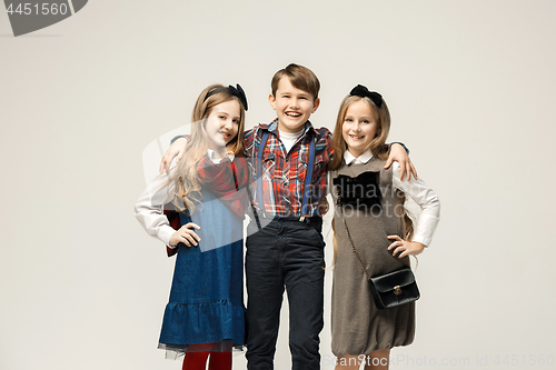 Image of Cute stylish children on white studio background