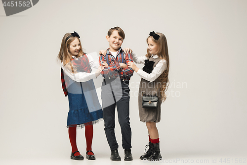 Image of Cute stylish children on white studio background