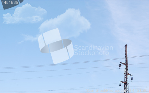 Image of white clouds and electric pole