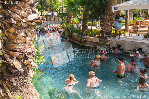 Image of Tourists swim in antique Cleopatra pool