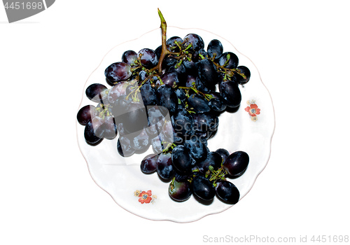 Image of the grapes lie on a plate