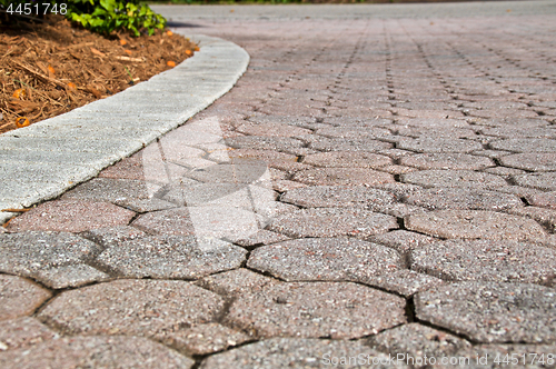 Image of low angle octagon brick paver driveway