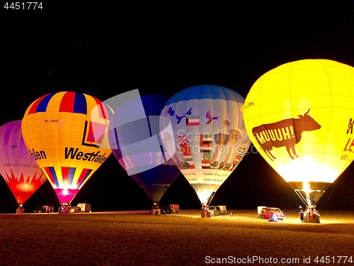 Image of The glow of hot air balloons at night during the World Ploughing Competition in Germany 2018