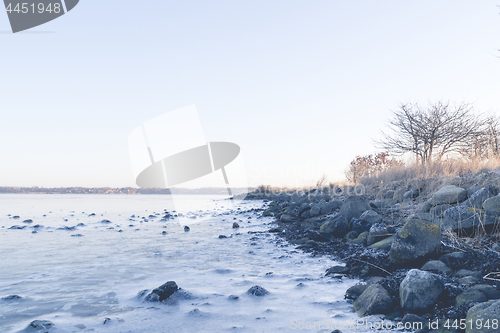 Image of Rocks in the frozen sea on a coastline