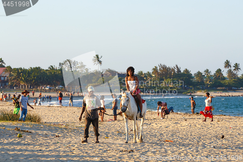 Image of Malagasy beauty, beautiful girls ride horse