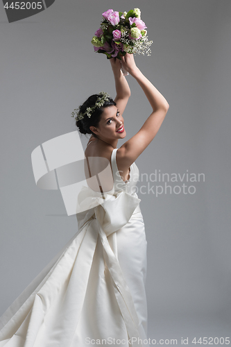 Image of bride with a bouquet  isolated on white background