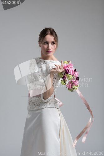 Image of bride with a bouquet  isolated on white background