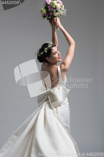 Image of bride with a bouquet  isolated on white background