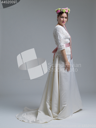Image of Portrait of beautiful young women in wedding dress
