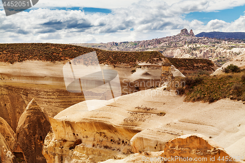 Image of Fairy houses stone cliffs