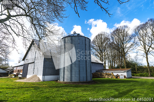 Image of Small farm with a large silo